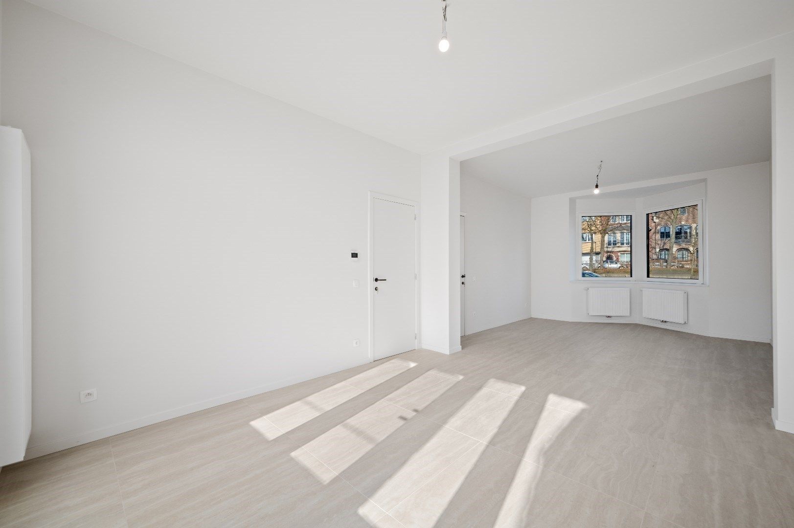 Super energiezuinige herenwoning EPC "A", 4 grote slpk, tuin op het zuiden, autostaanplaats  foto 4