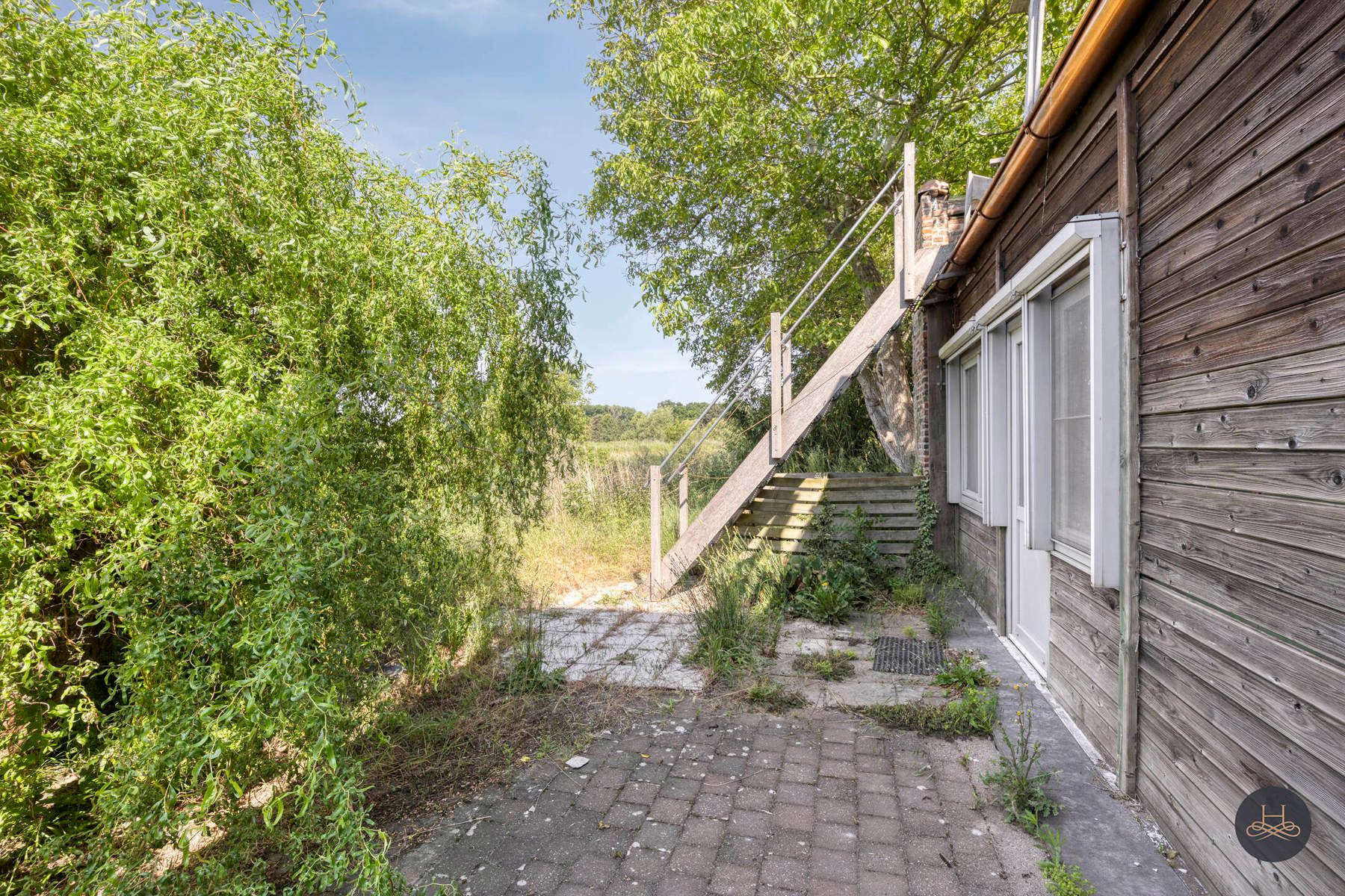 Op te knappen woning met uitzicht op de Dijle te Rotselaar foto 26
