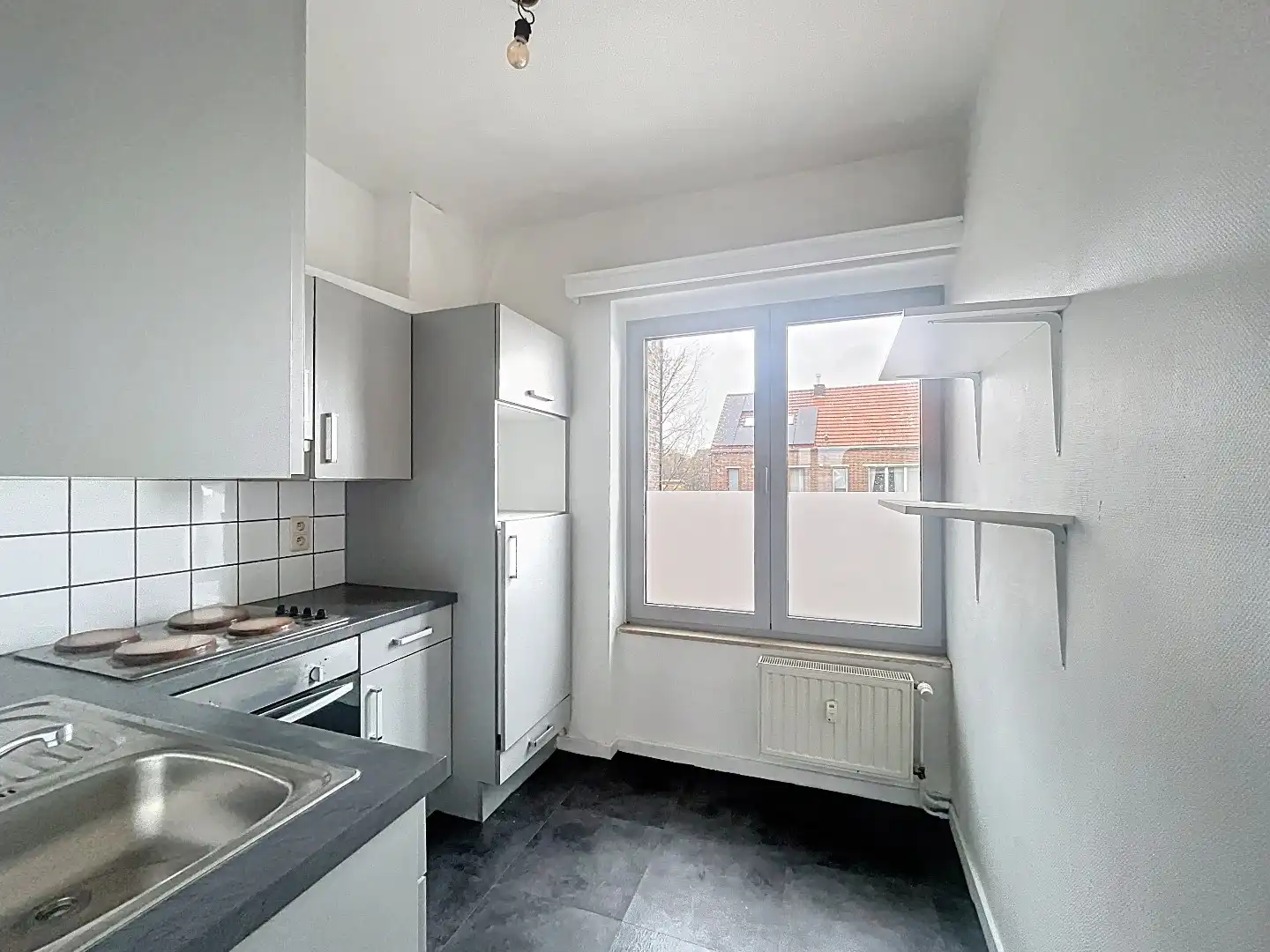 Veelzijdig pand op topligging: wonen en werken of tweewoonst met terrassen en garage foto 14