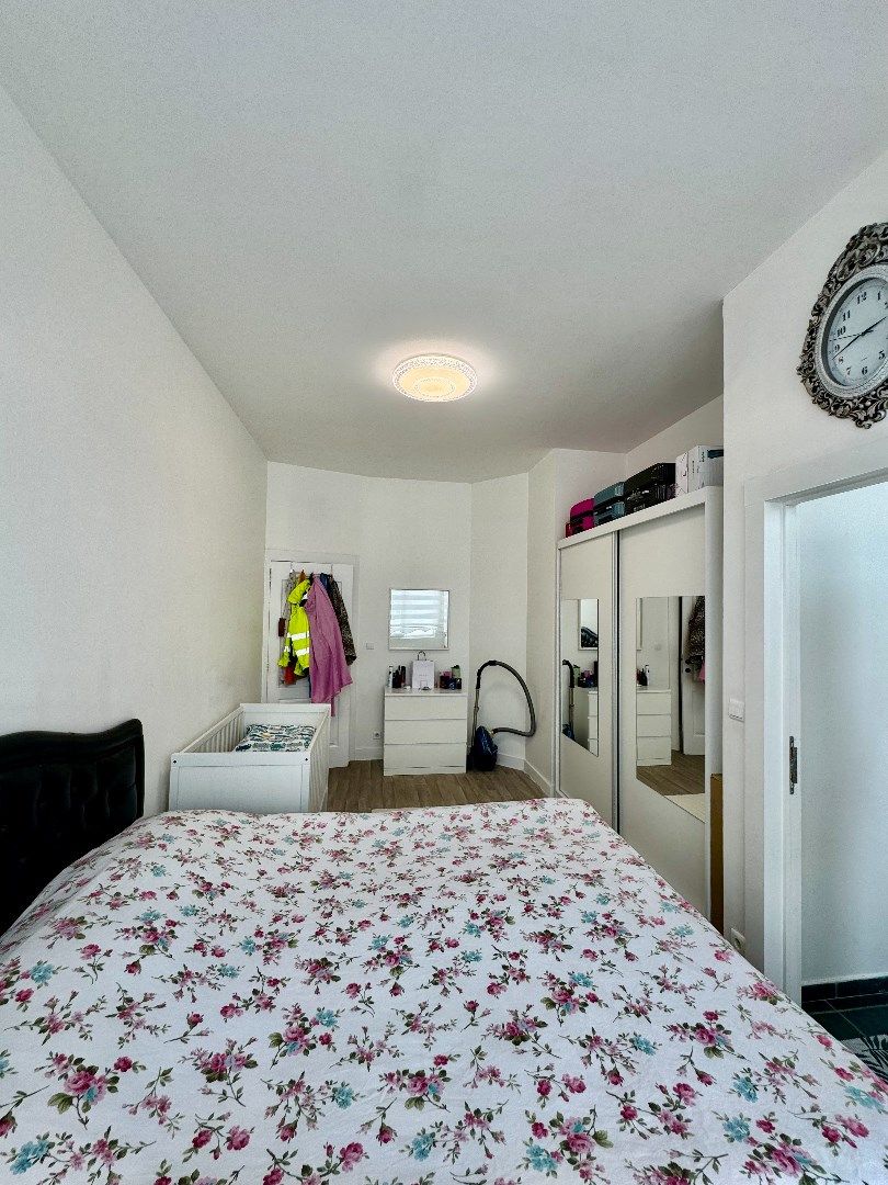 Licht en ruim 2-slaapkamerappartement te koop in Laken foto 21