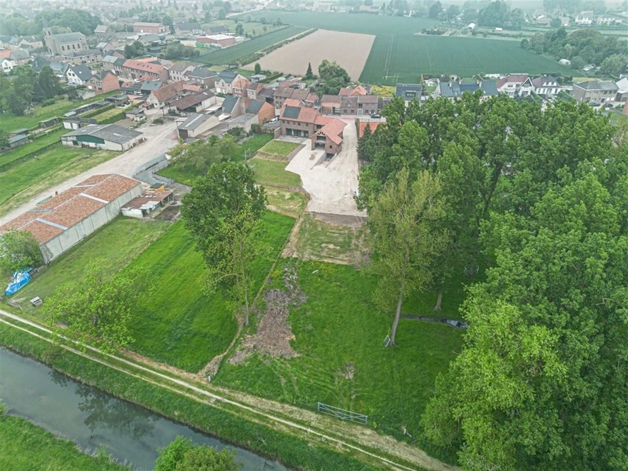 UNIEKE LANDELIJKE GEZINSWONING MET BIJBOUW VAN 320M² OP PRACHTIG PERCEEL  foto 38