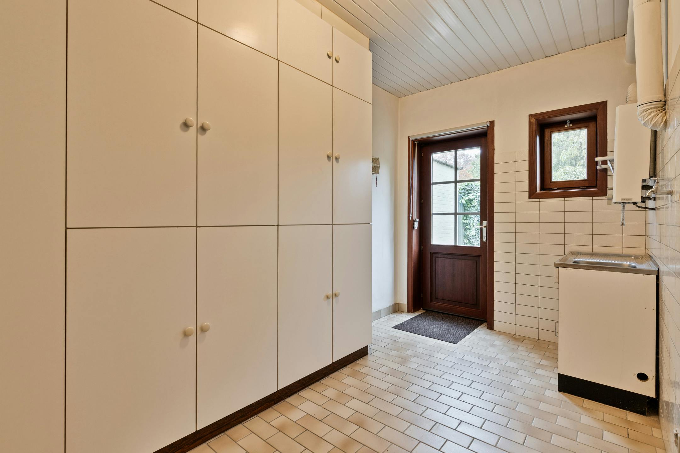 Halfopen woning met 4 slpk en mooie tuin te koop in Kapellen foto 11