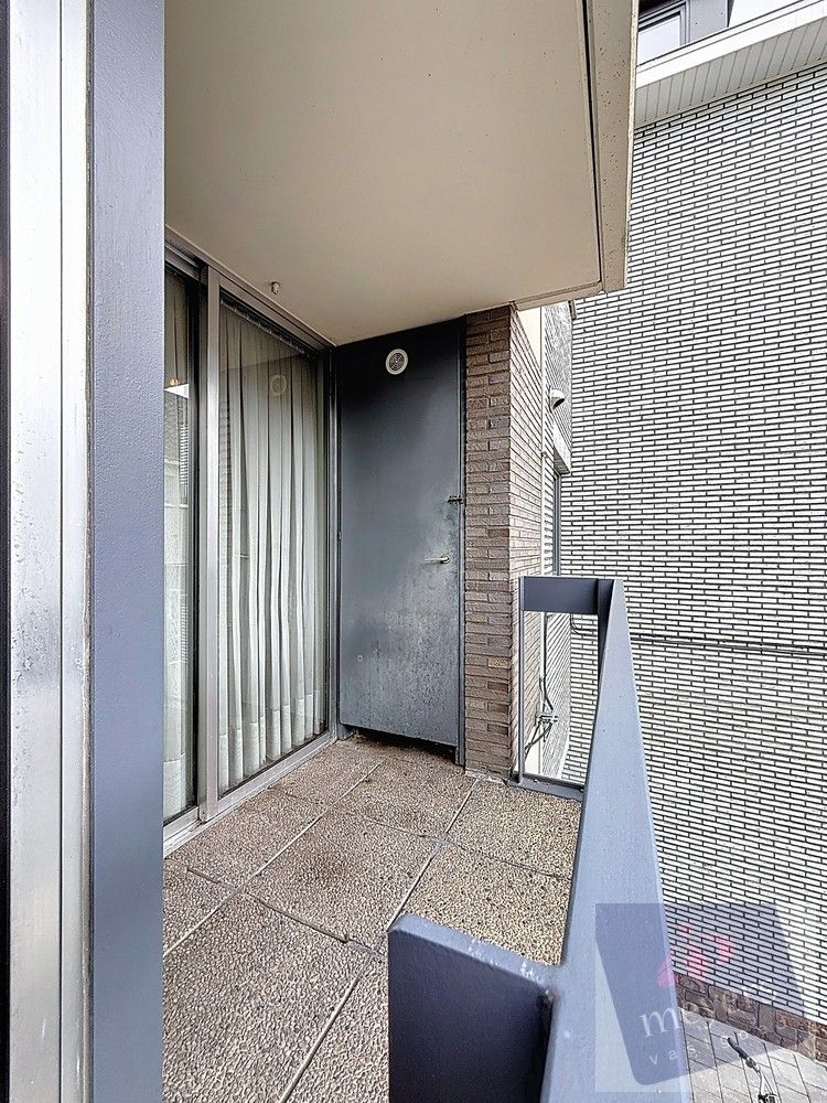 Ruim appartement met 2 slaapkamers en garage foto 7