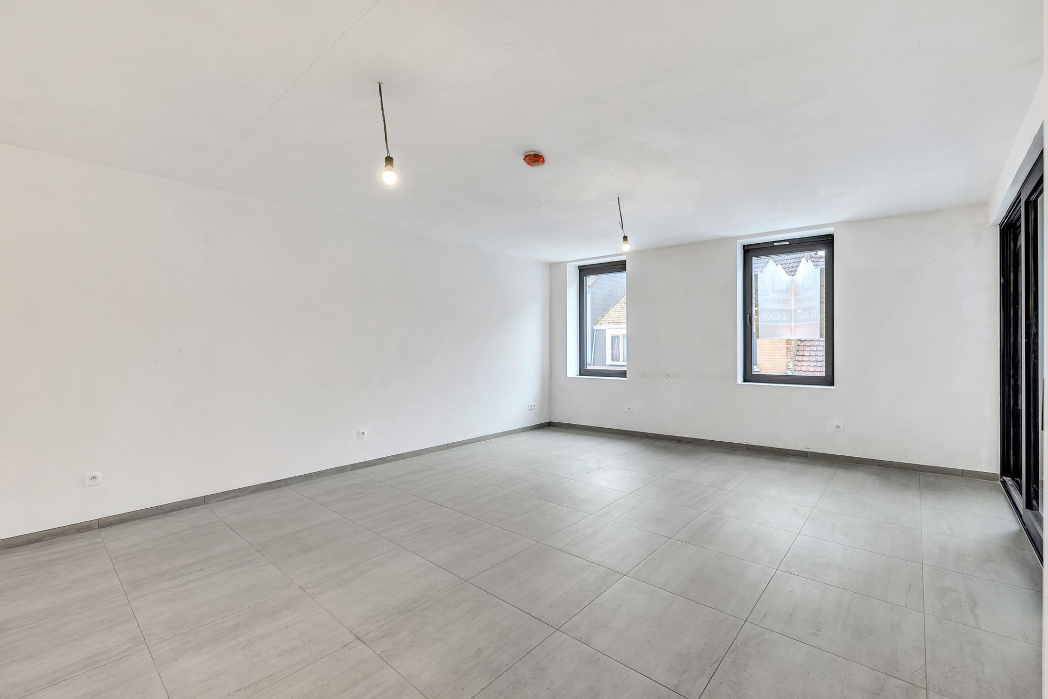 Opbrengsteigendom met 3 appartementen en handelsgelijkvloers foto 8