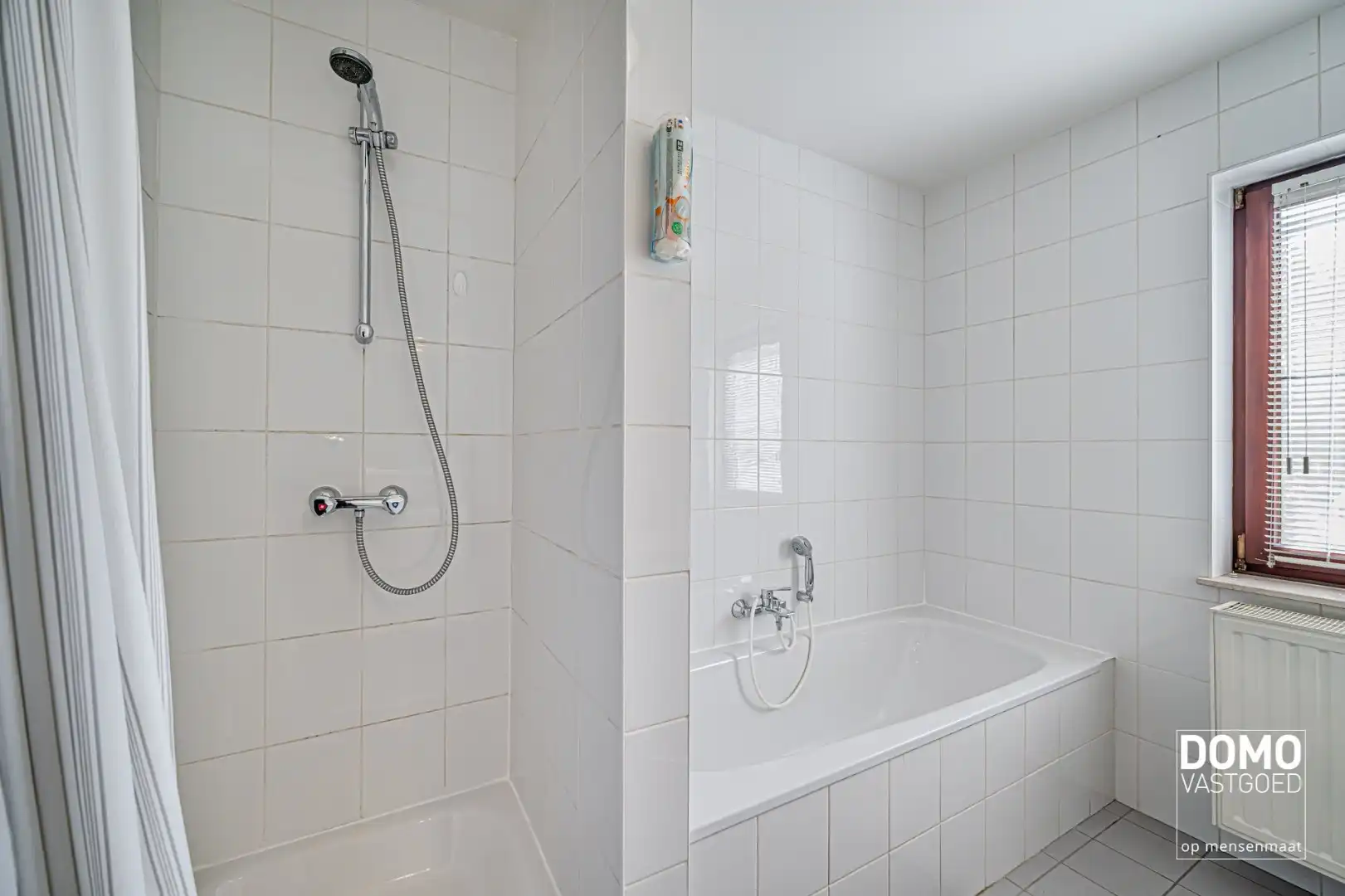 ZUIDWESTELIJK GEORIËNTEERDE DOORZONWONING MET LICHTRIJKE AANBOUW, GEZELLIGE TUIN EN RUIME GARAGE TE KURINGEN (HASSELT)  foto 18