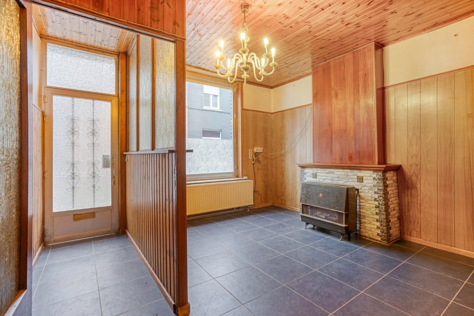 Goedgelegen rijwoning foto 2