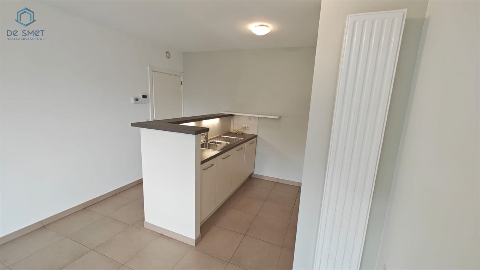 Nieuw te koop in Halle Instapklaar 1-slaapkamerappartement met ruime garagebox! foto 4