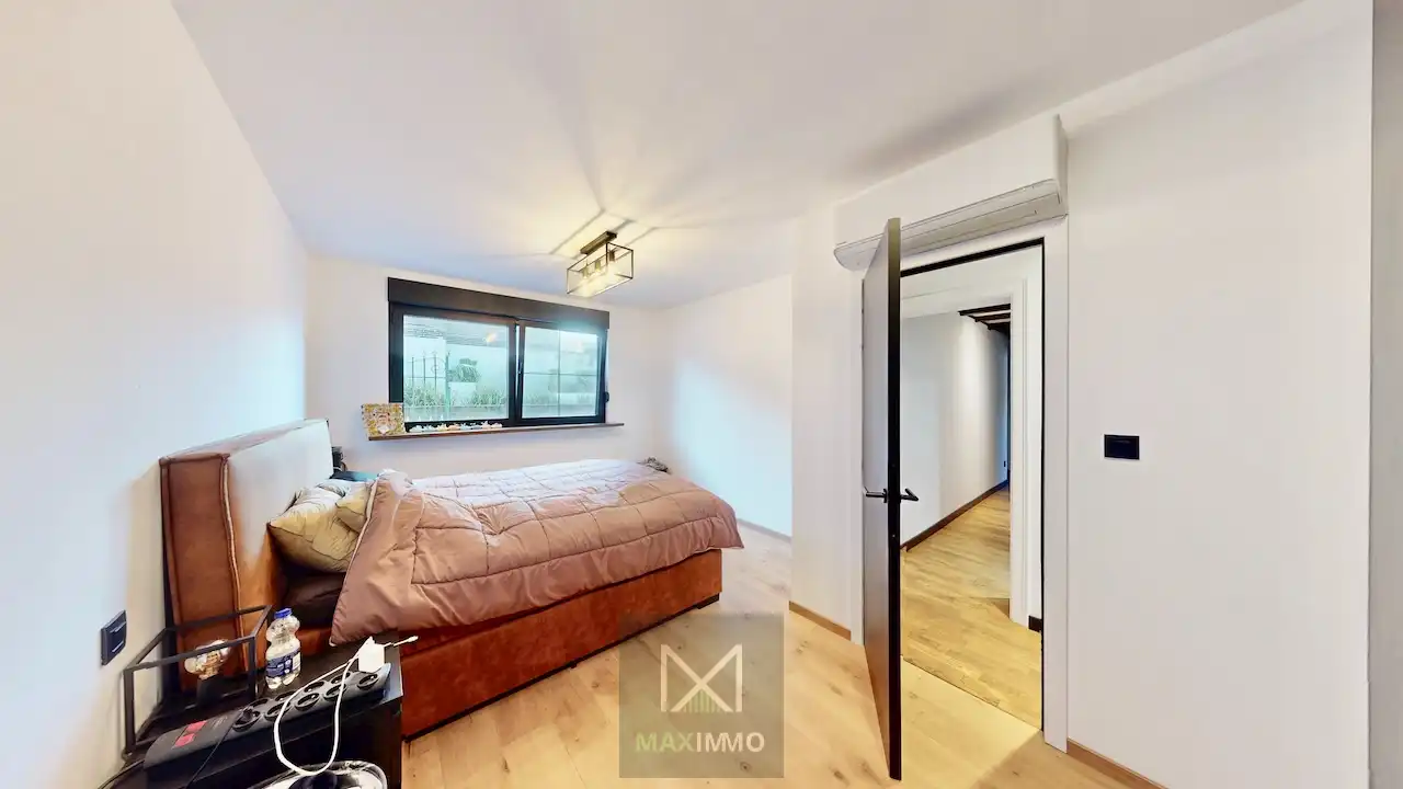 Gelijkvloerse bungalow met loods van 180 m² in het centrum van Marke foto 9