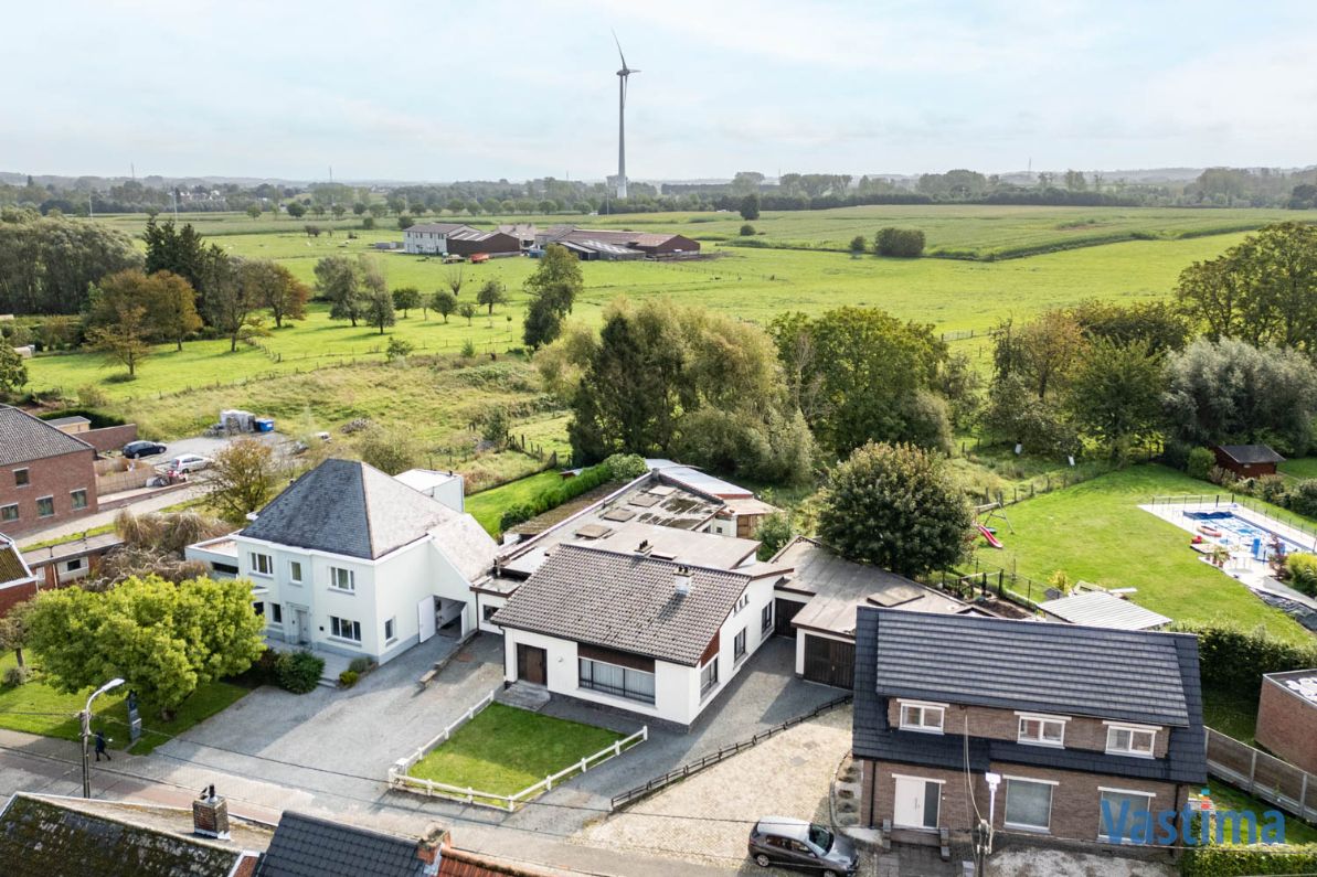 Gezinswoning met grote loods op een prachtig perceel foto 40