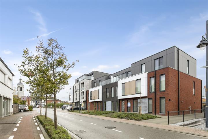 Gelijkvloers appartement met terras en tuintje foto 2