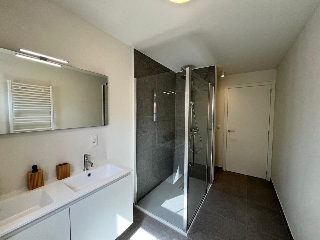 Moderne nieuwbouwwoningen met hedendaags comfort te Puurs- Sint- Amands. foto 12