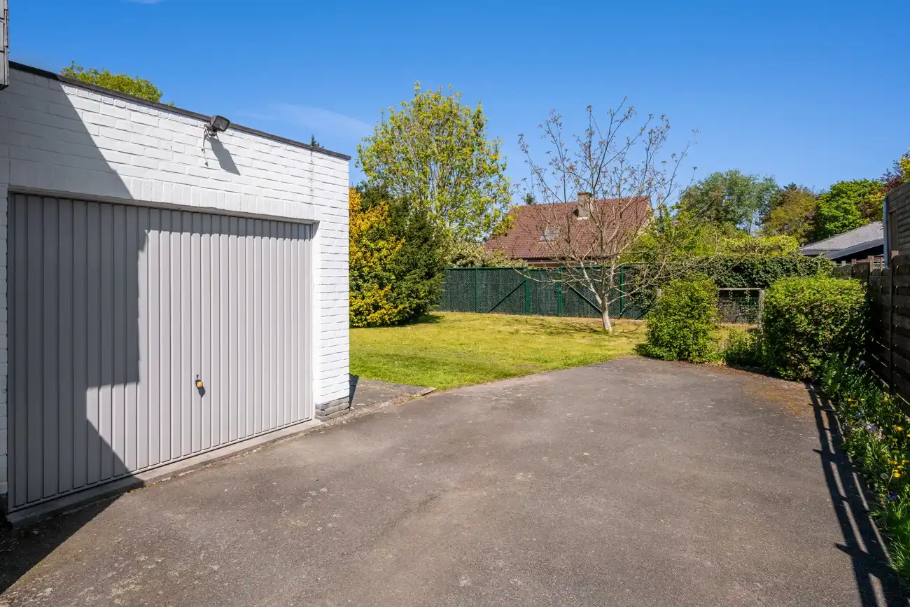 Architecturale gelijkvloerse open woning met inpandige garage op toplocatie nabij het centrum van Lochristi! foto 5