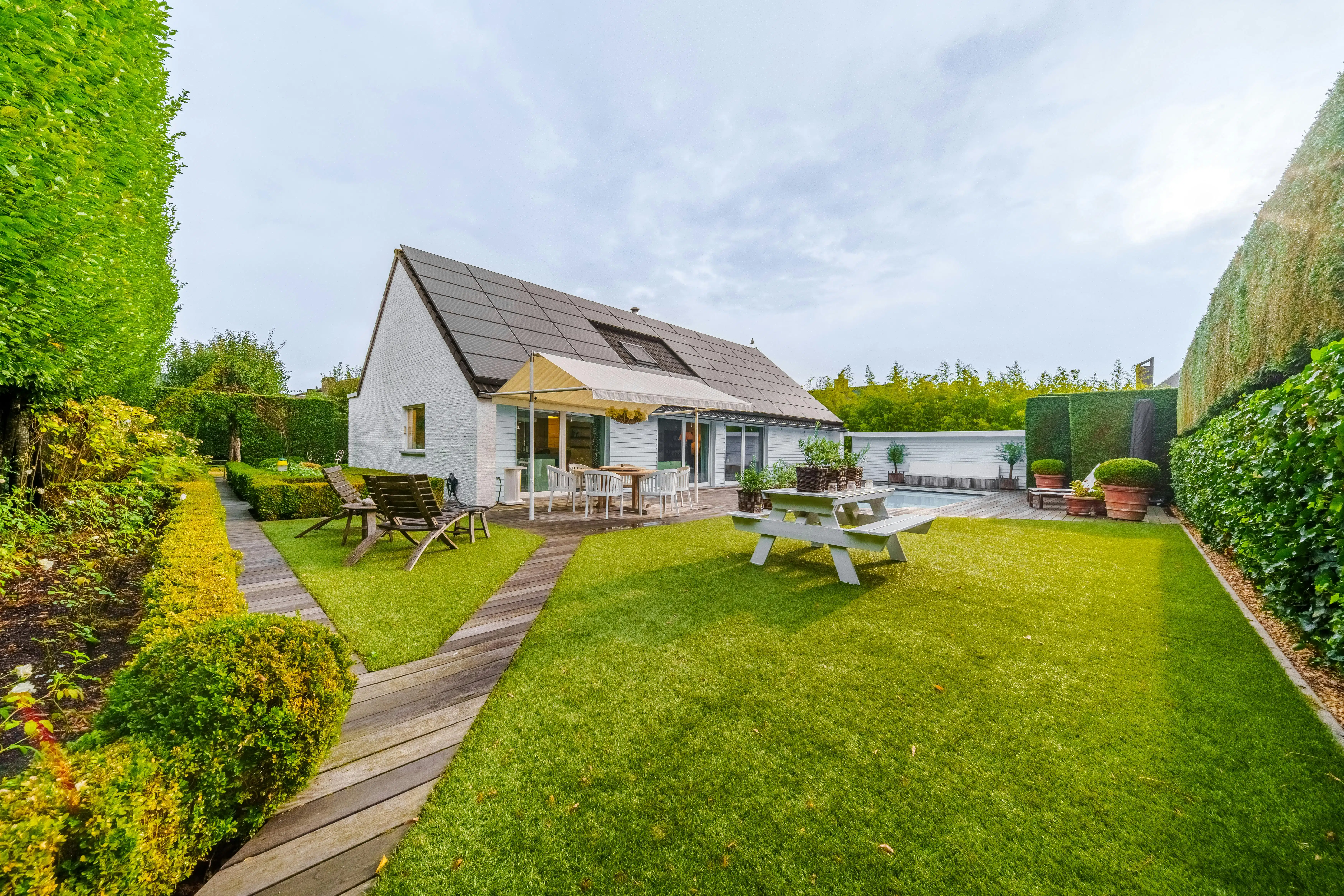Villa met zwembad te koop in villawijk 't Motje in Roeselare foto 4