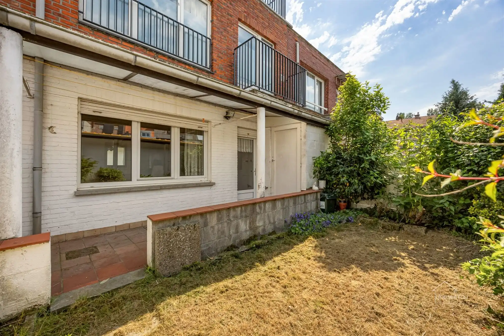 Op te frissen appartement met 1slpk, tuin en een garagebox te Schoten! foto 11