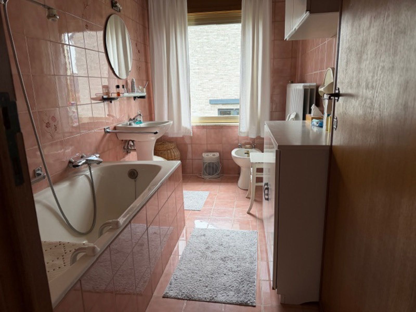 Charmante splitlevelwoning 2 slpks en grote garage te Tienen foto 12