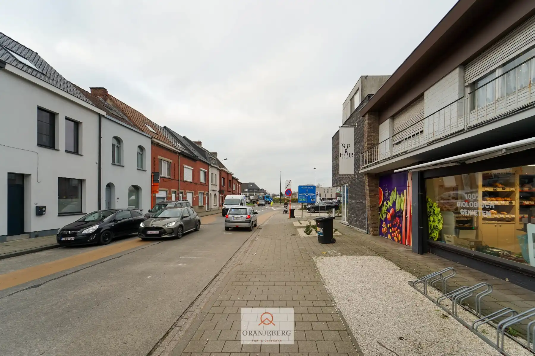 Ruim handelspand met meerdere ruimtes en parking te huur in centrum Drongen foto 25