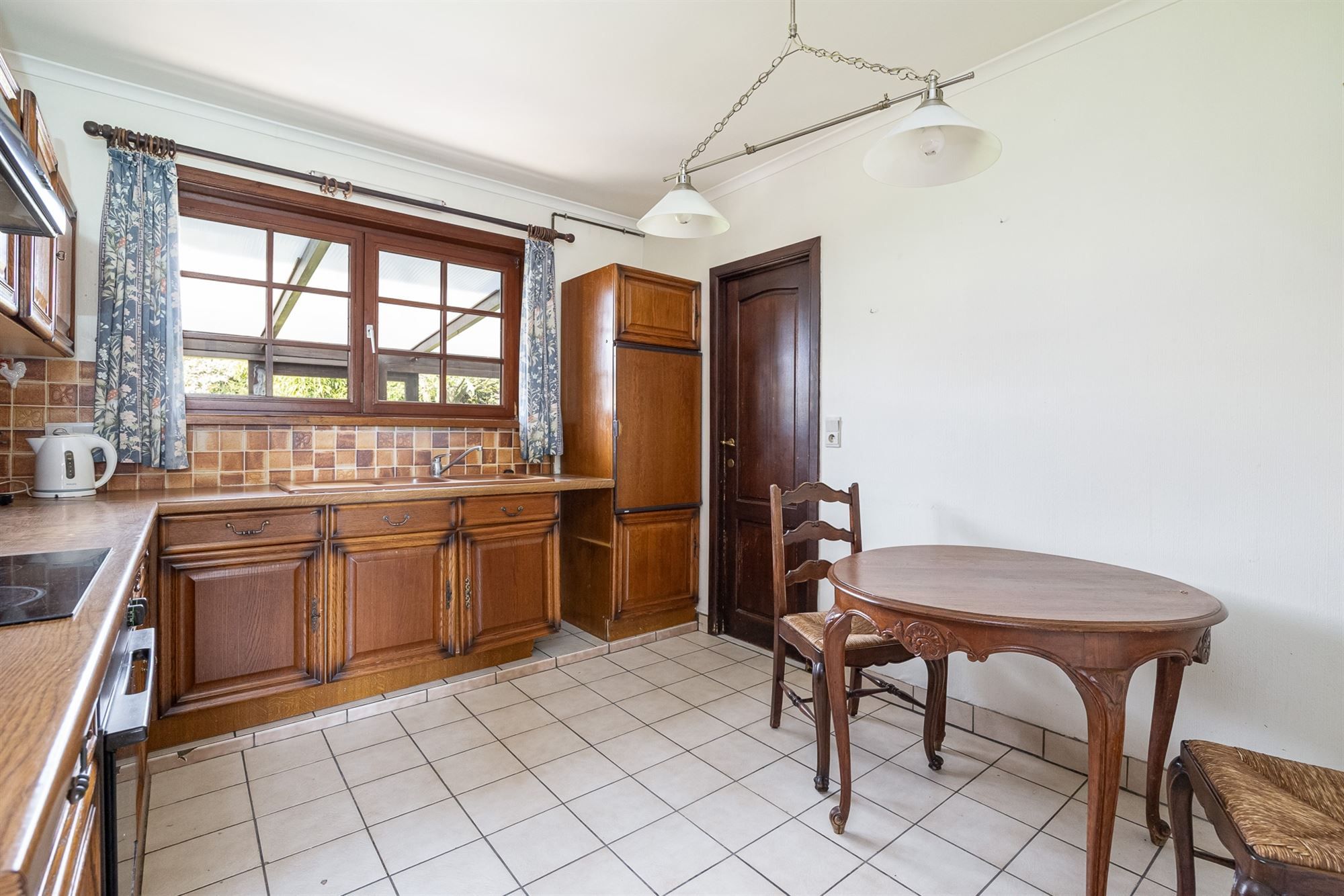 Open bebouwing met drie slaapkamers en grote tuin foto 9
