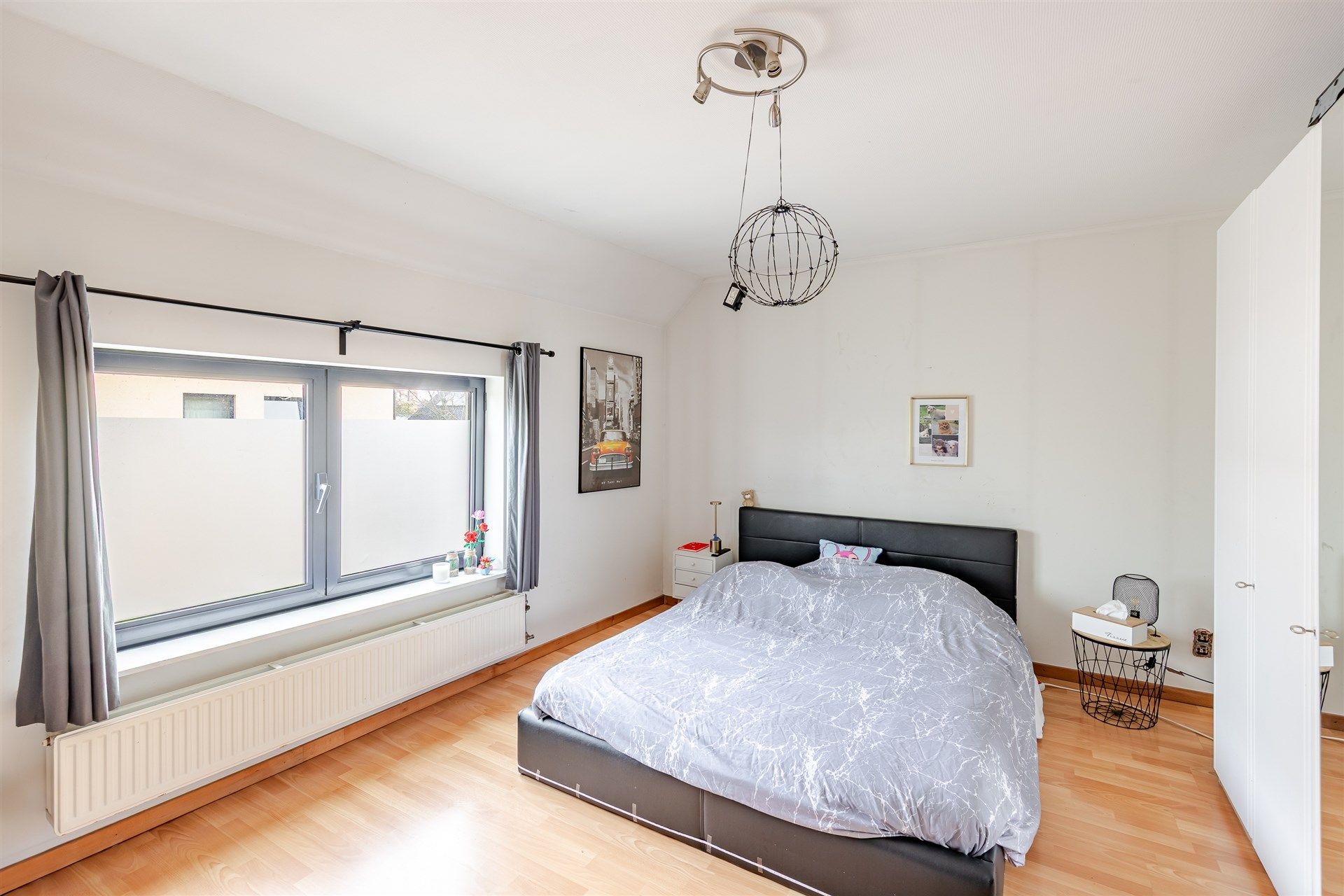 Bijzonder ruime woning met diepe tuin in Wetteren centrum foto 15