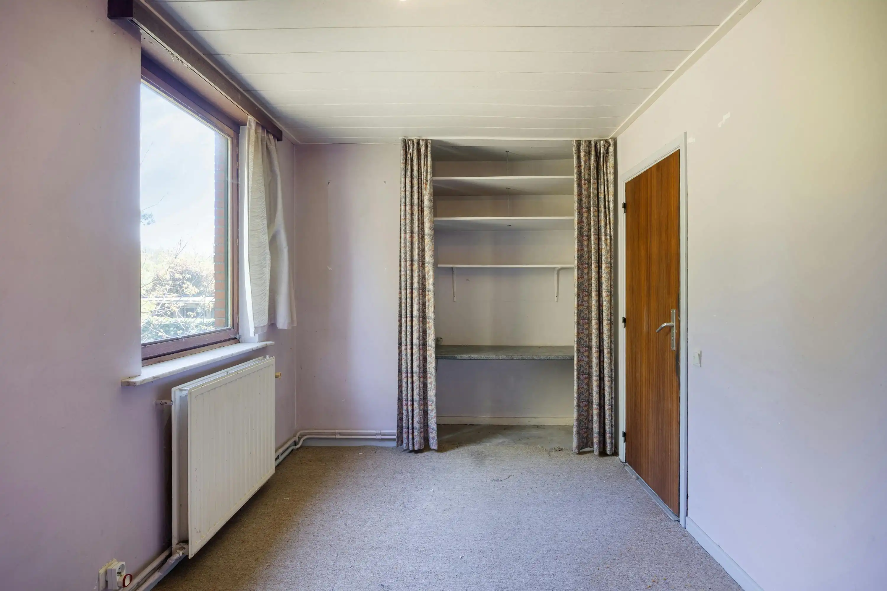 Te renoveren woning met grote tuin in Heide-Kalmthout! foto 13