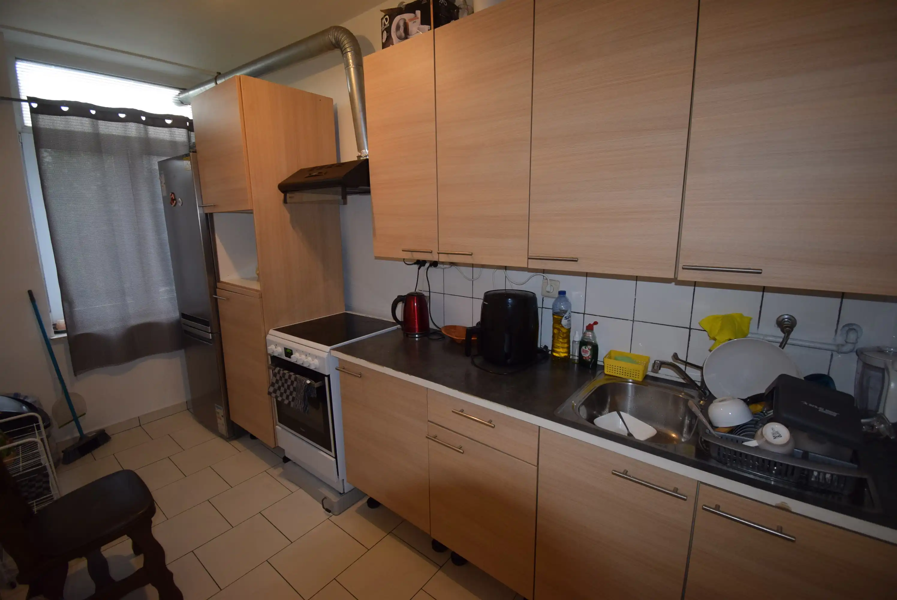 Opbrengstwoning met een commercieel gelijkvloers foto 9