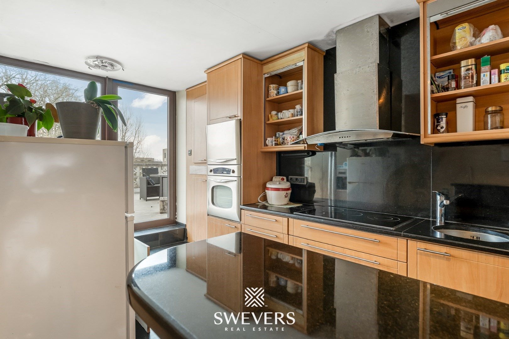 Instapklaar opbrengsteigendom met handelspand en 2 appartementen in Zonhoven foto 5