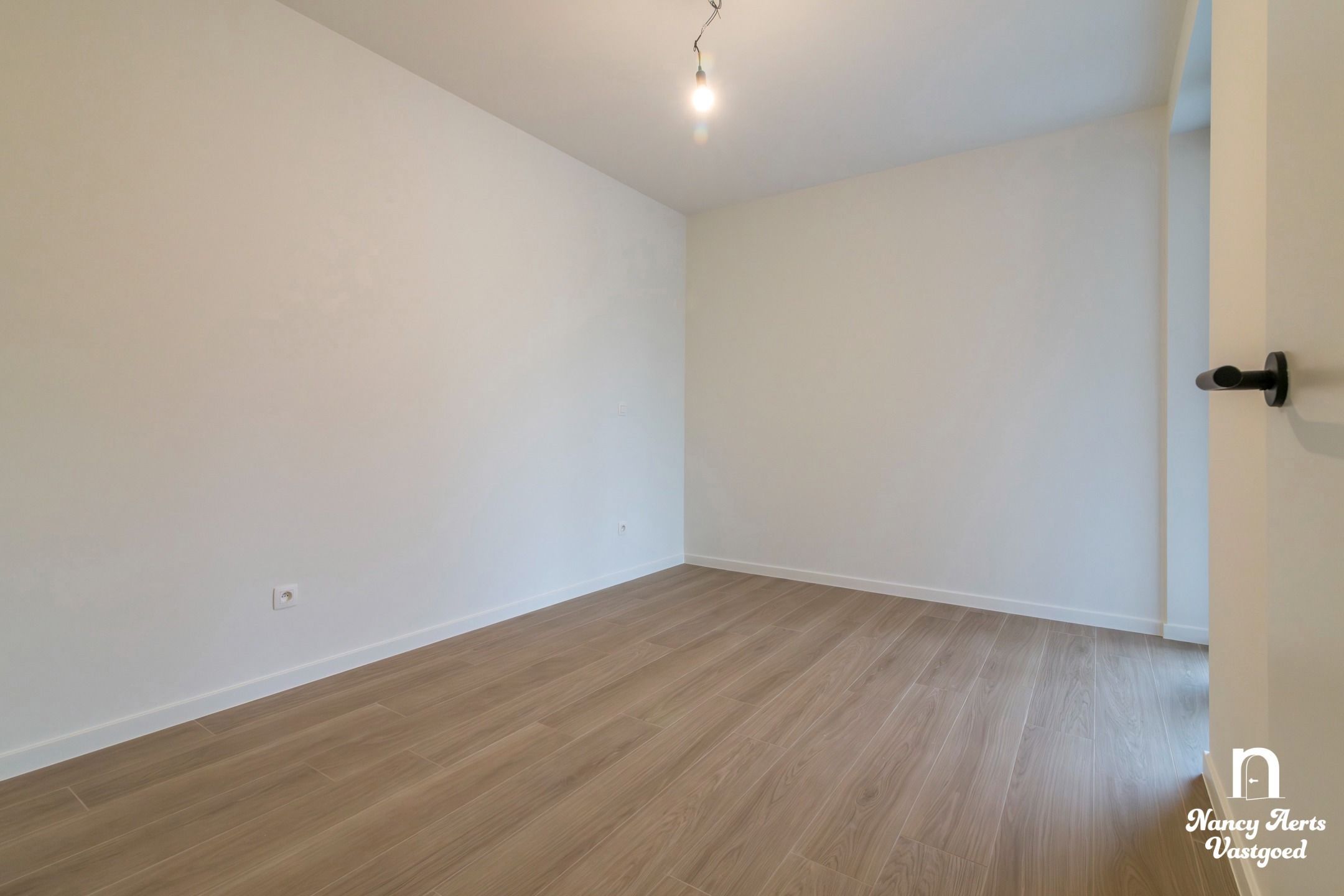 Nieuwbouwappartement met terras in het centrum van Beverlo foto 17