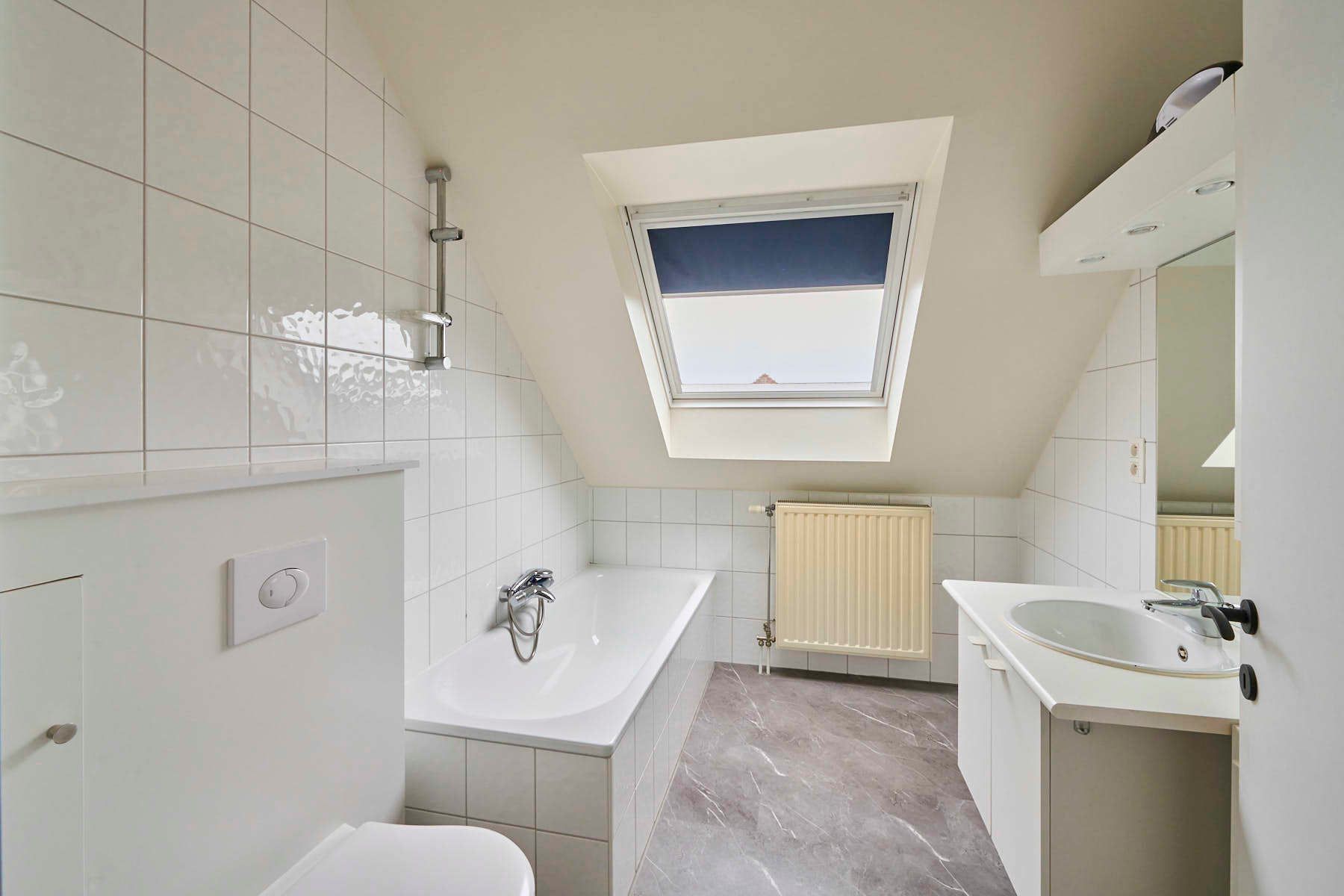 Lichtrijke duplex met open keuken en 2 slaapkamers foto 12