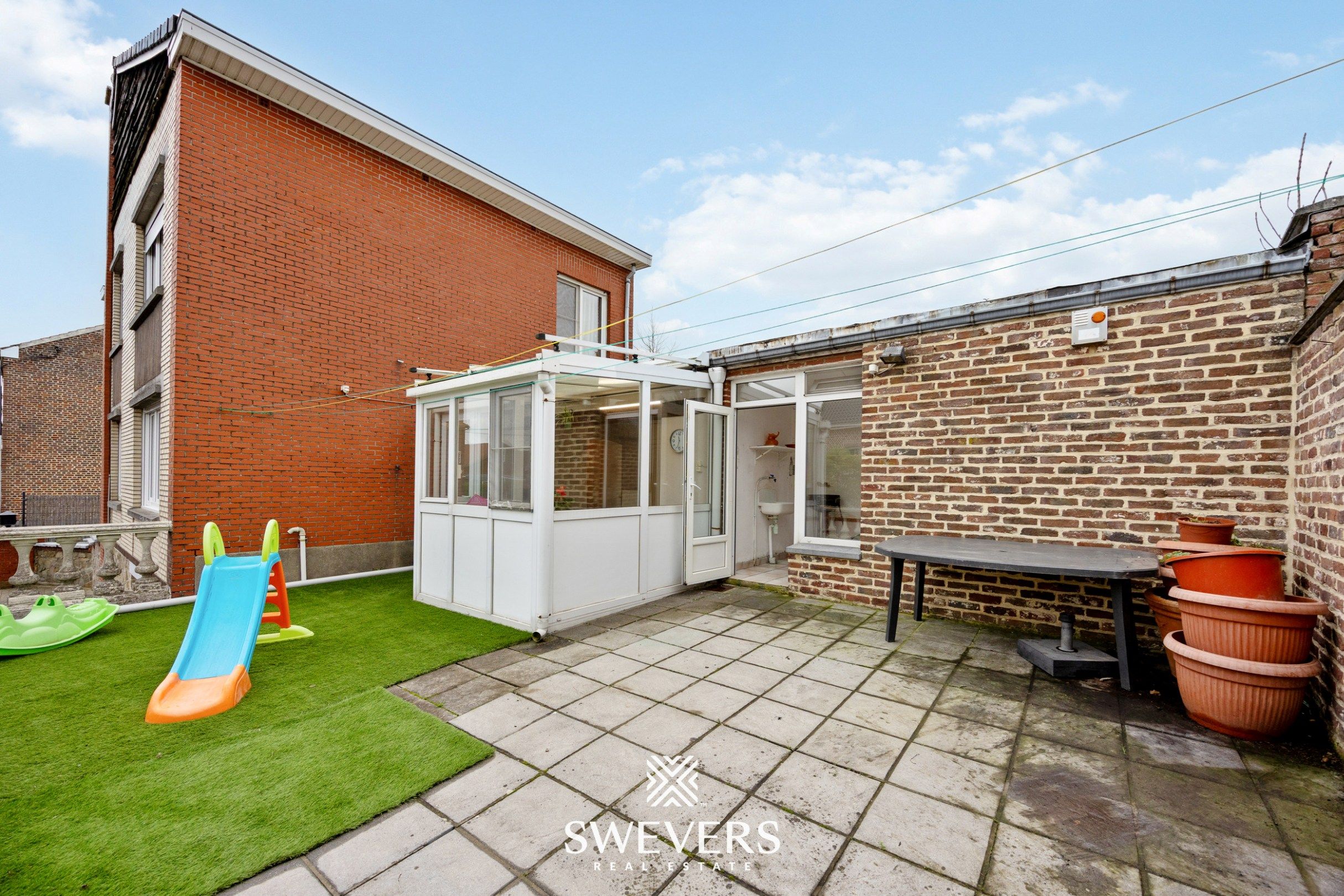 Open bebouwing met 3 slaapkamers en garage in rustige straat foto 25