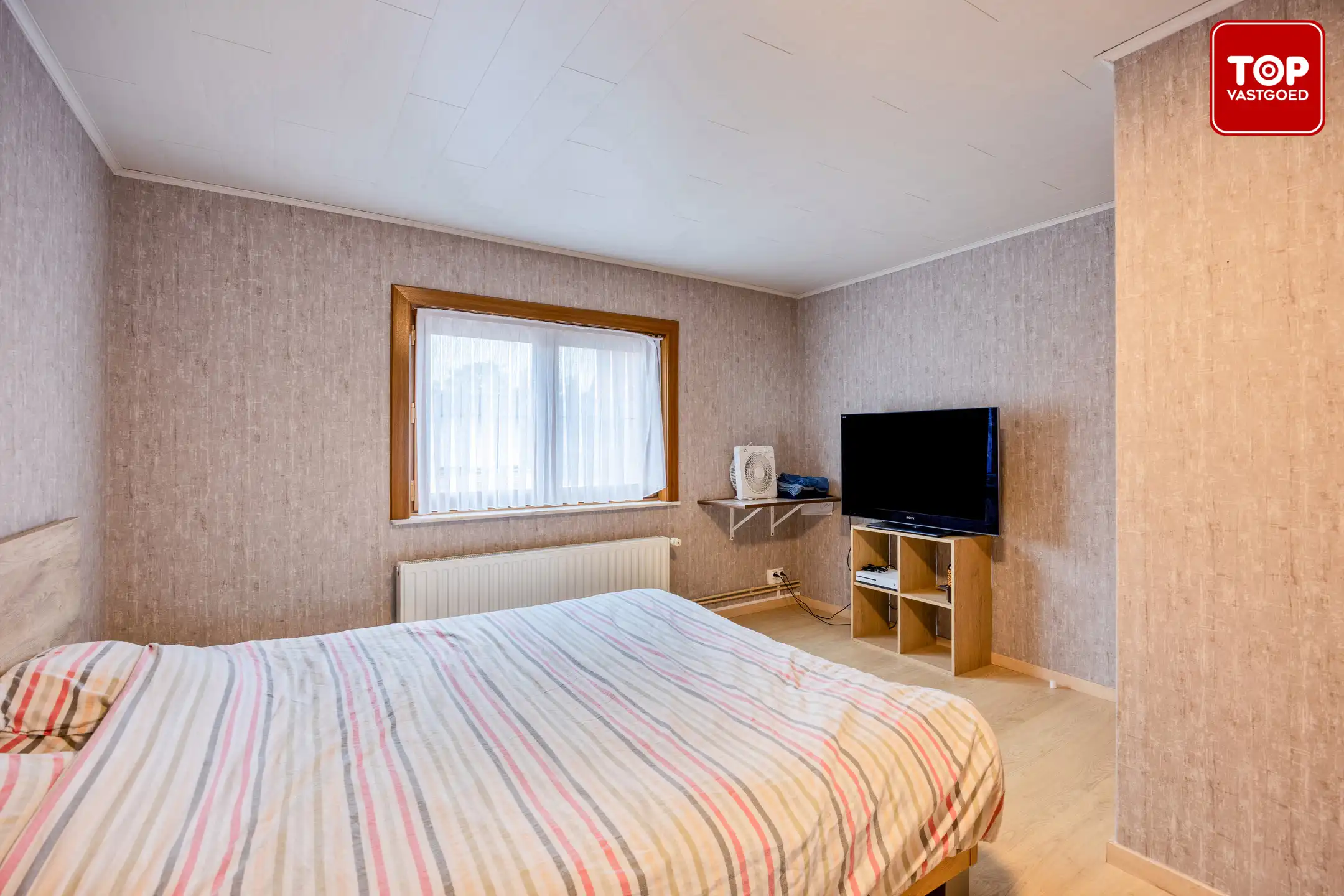 Instapklare woning met 3 slaapkamers en garage.  foto 15