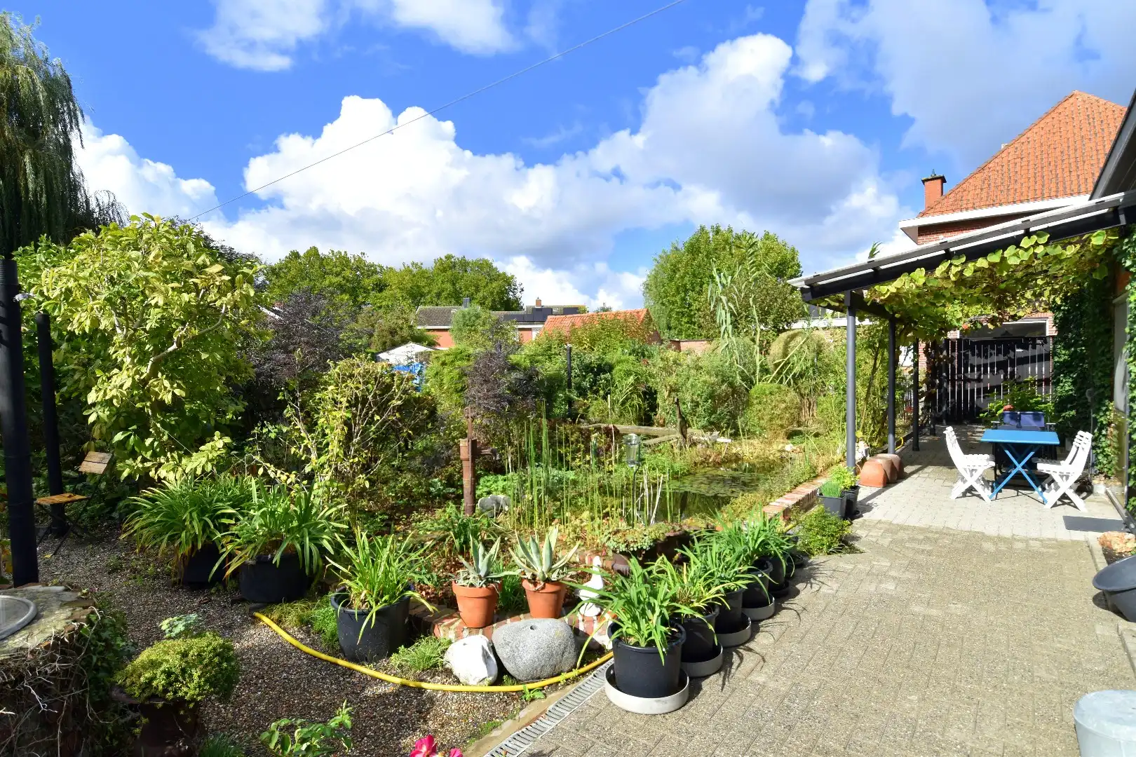 Charmante woning met 3 slaapkamers, 2 garages en een zalige tuin te koop in Gullegem! foto 20