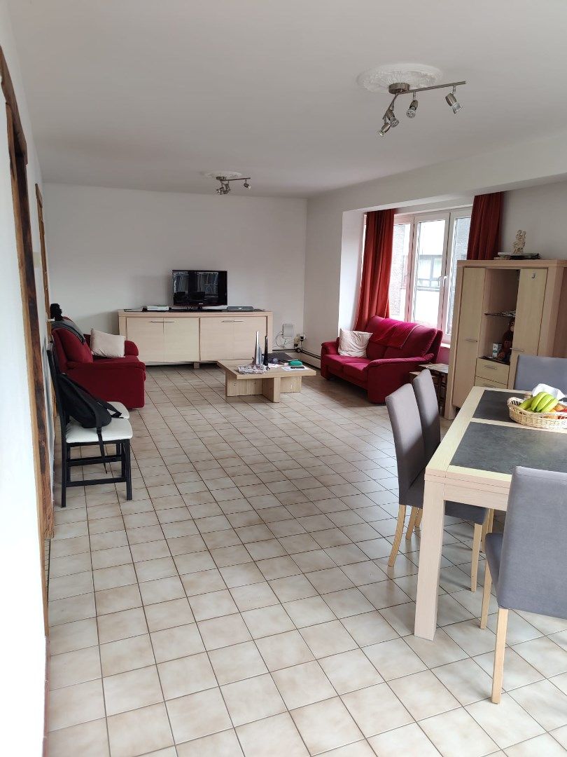 Opbrengsteigendom: 7 appartementen met 3 garages. foto 13