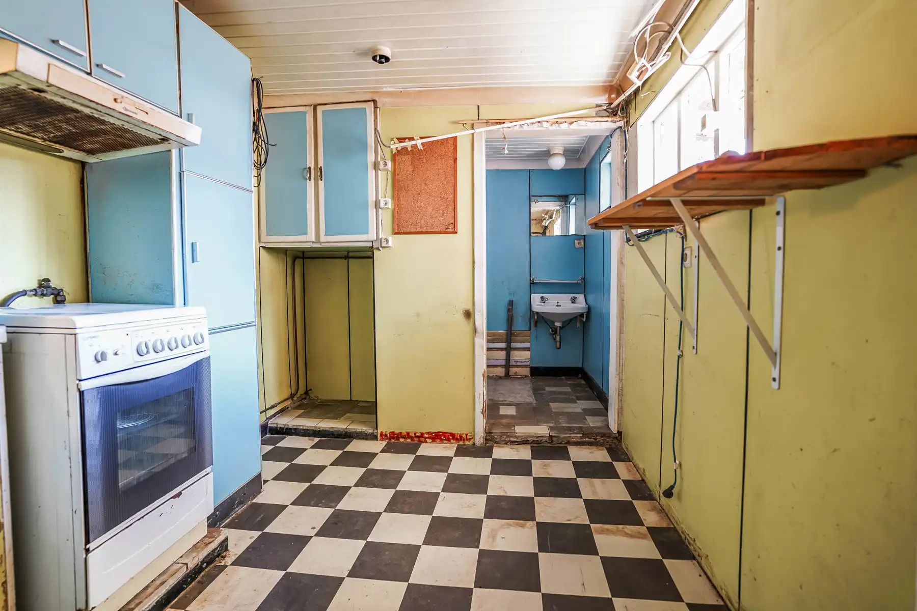 Te renoveren rijwoning met tuin te Kapelle-op-den-Bos foto 8