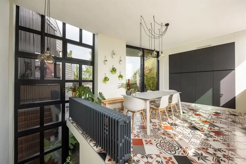 Unieke woning met eclectische gevels en dakterras foto 5