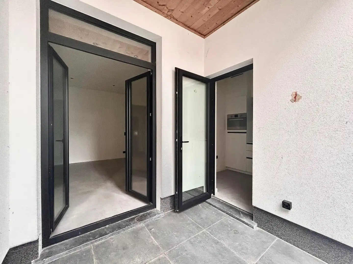 Gezellig gelijkvloers 2-slpk app met tuin. foto 15