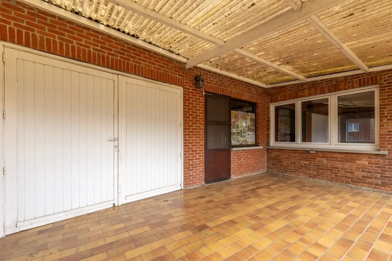Karaktervolle woning met grote tuin, bijgebouwen en uitbreidbaar zoldervolume op een verrassend diep perceel foto 14