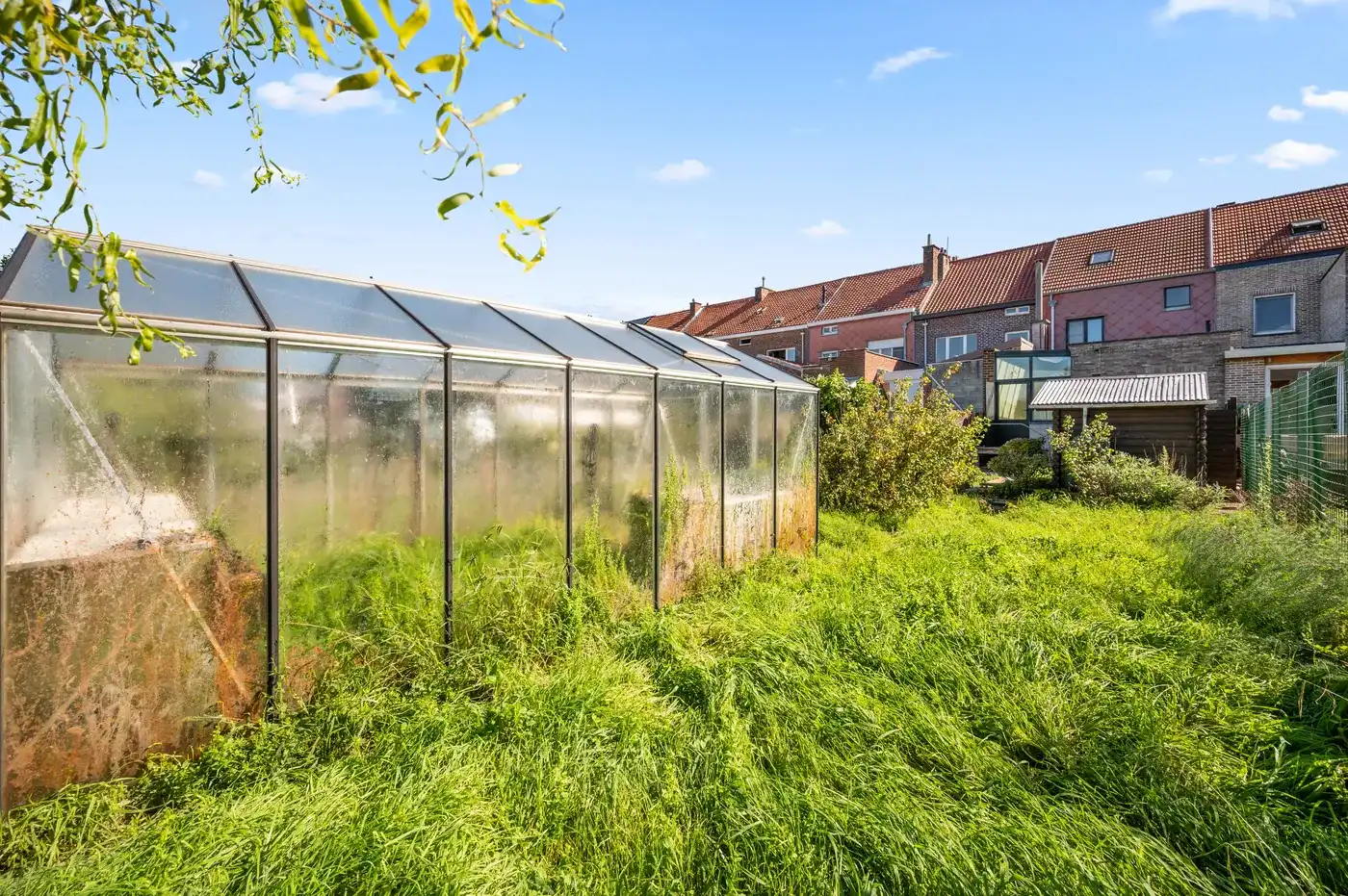 Charmante rijwoning met 2 slpk, tuin en parking foto 26