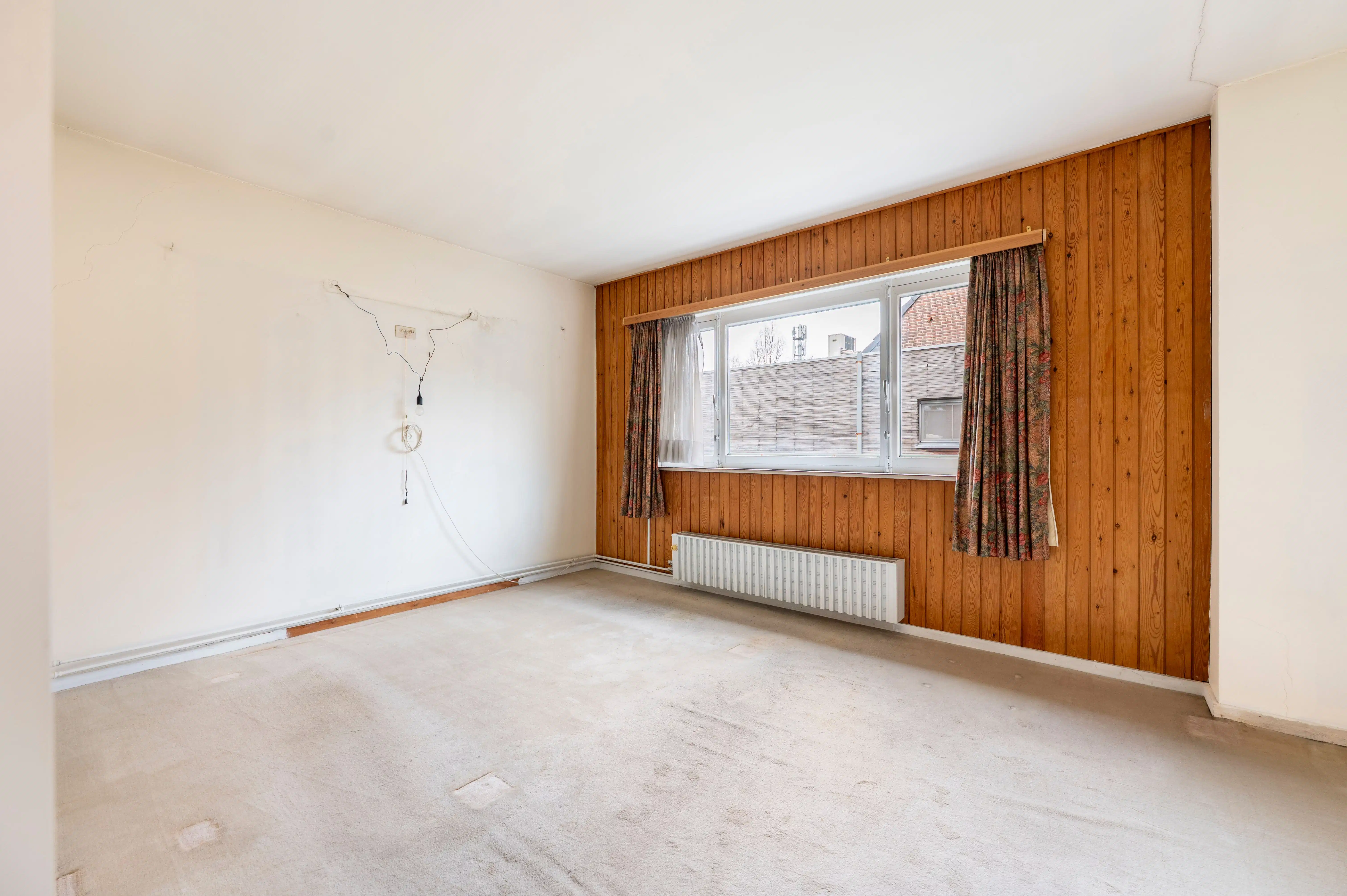 Halfopen bebouwing met veel potentieel, zonnige tuin en garage in Kapellen! foto 15