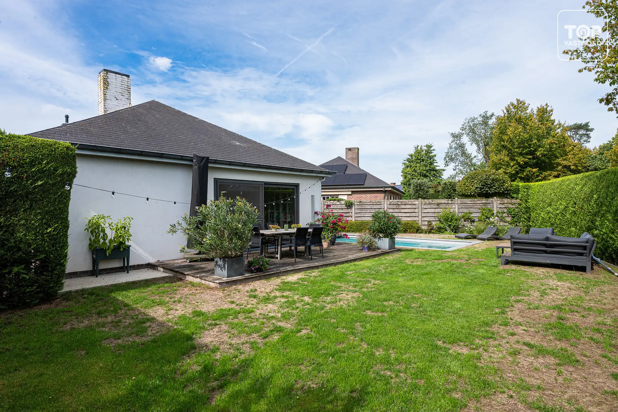 Instapklare woning op een ruim perceel met verwarmd zwembad foto 22