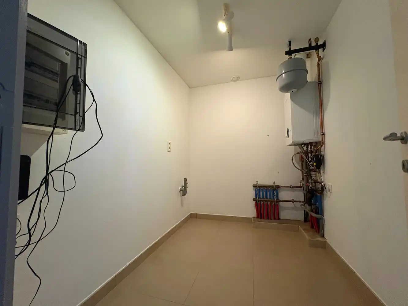 Gelijkvloers appartement met twee slaapkamers + autostaanplaats foto 10