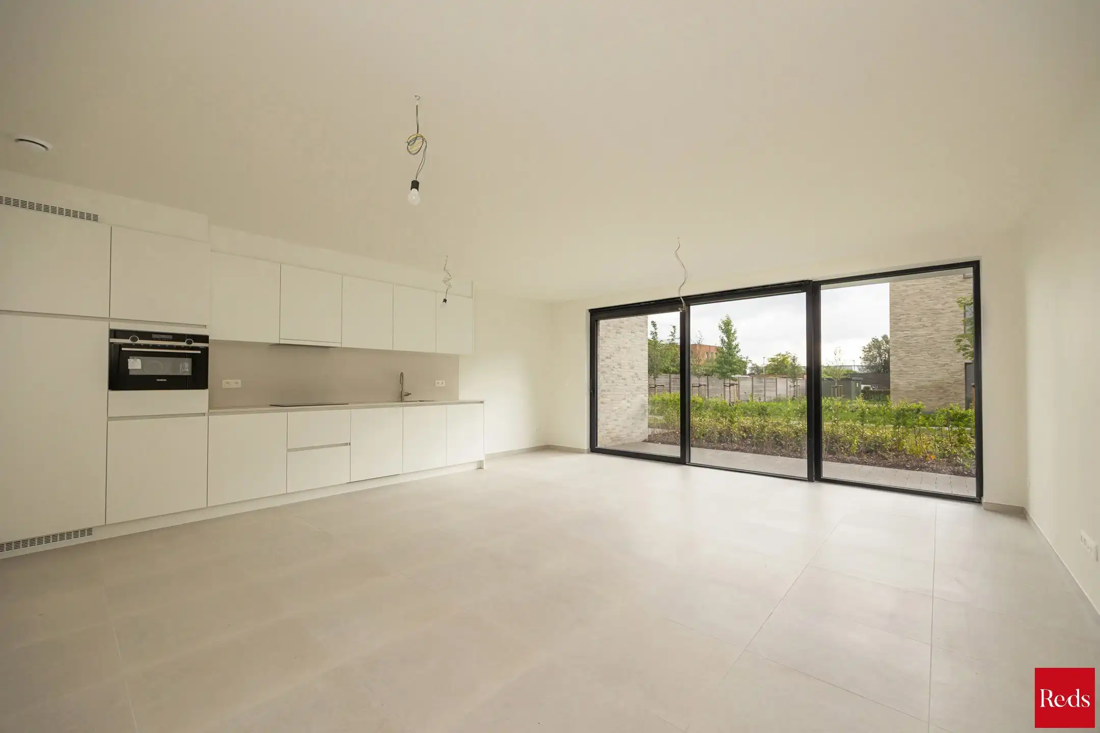 Nieuw gelijkvloers appartement met 2 slaapkamers te huur foto 3