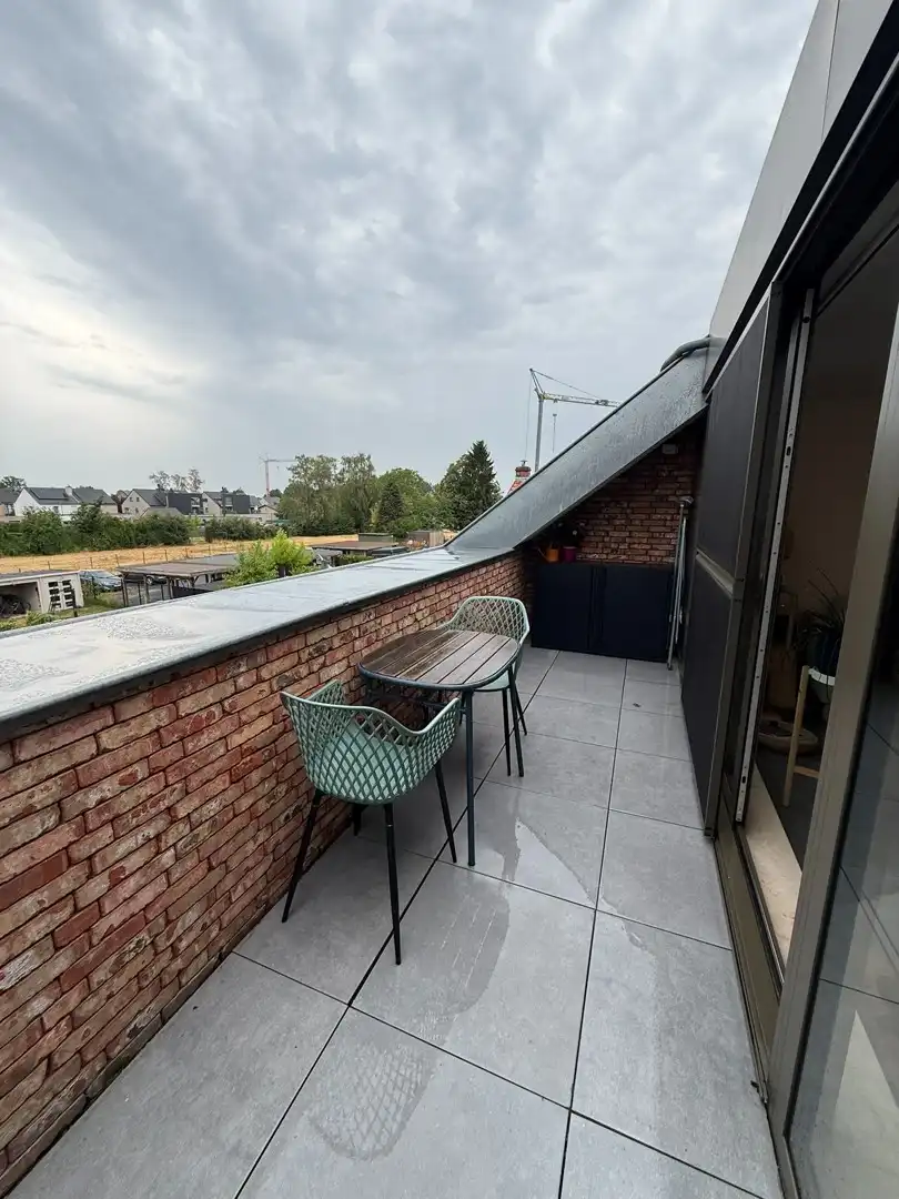 Prachtig instapklaar 1-slaapkamer duplex-appartement vlakbij het centrum van Diepenbeek. foto 8
