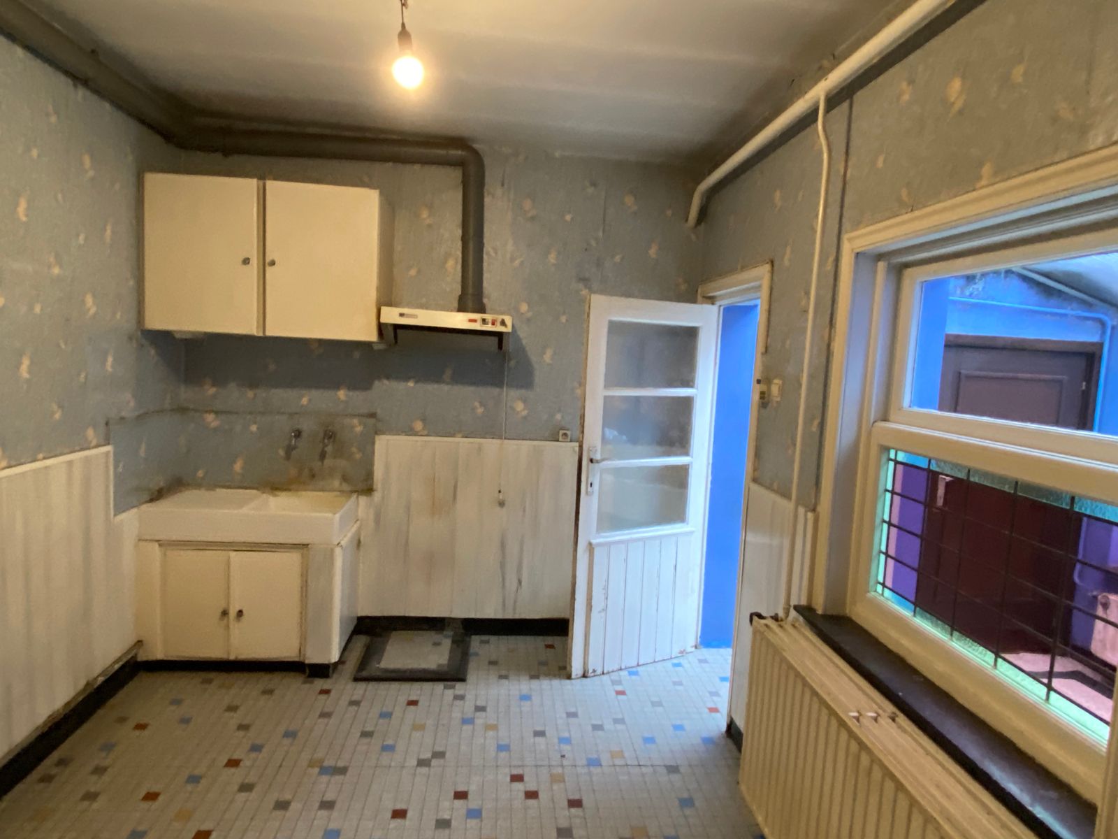 Zeer goed gelegen te renoveren woning foto 5