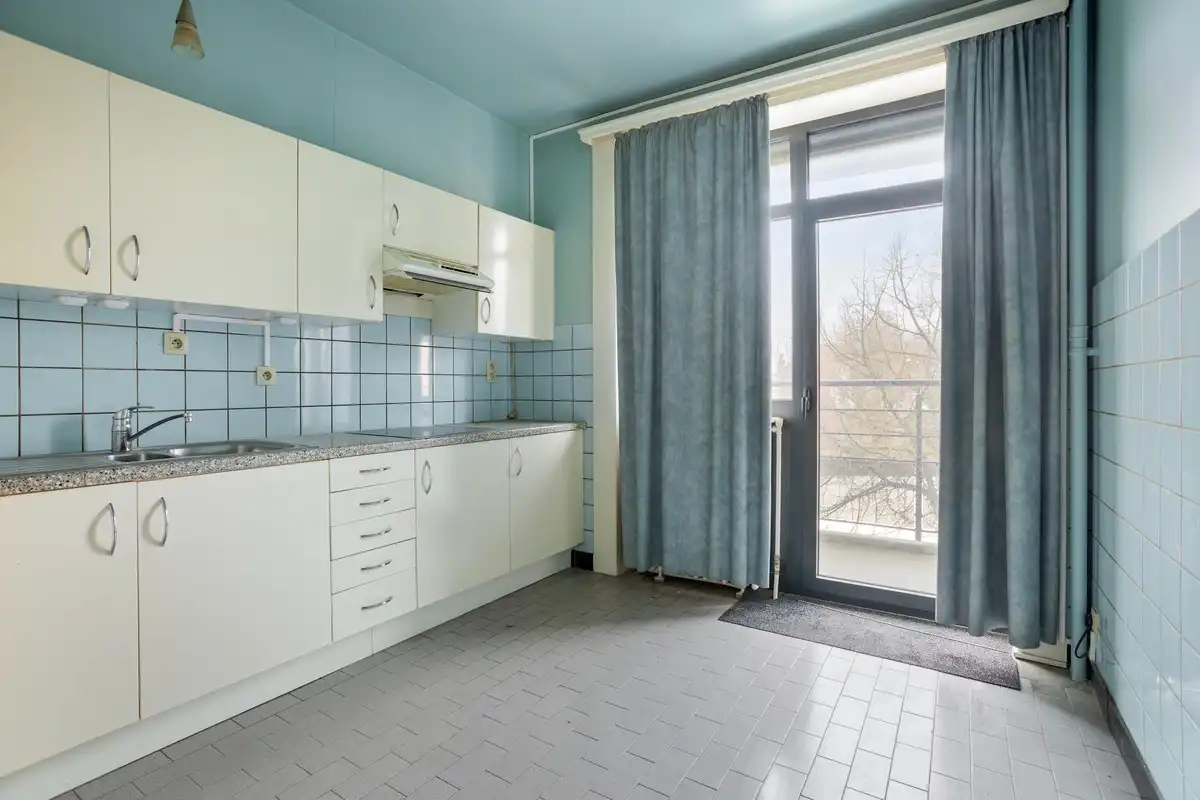 Ruim appartement met 3 slaapkamers, kelderberging en garagebox aan de rand van het centrum foto 7