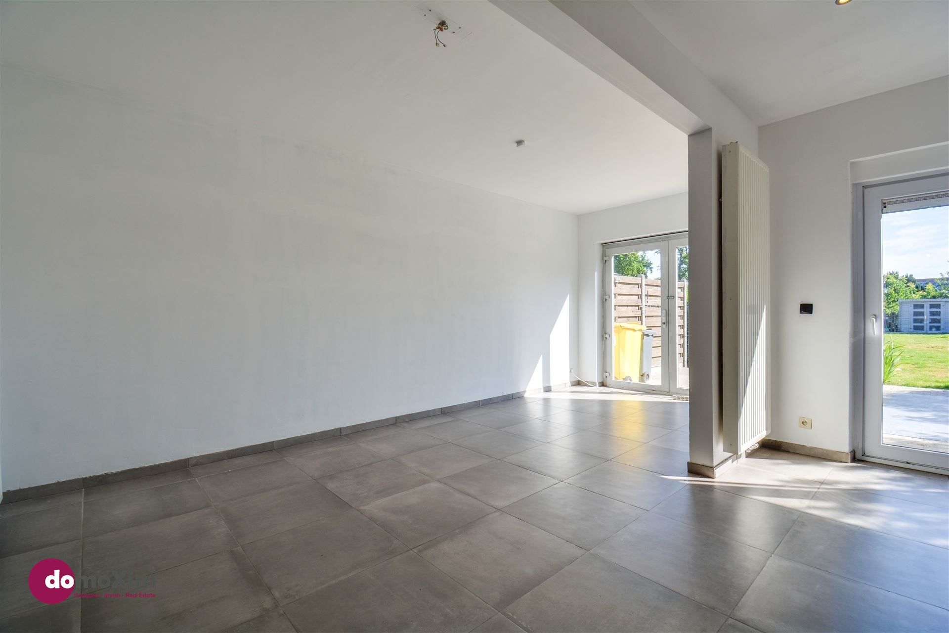 Centraal gelegen, ruime woning met tuin, garage én potentieel foto 9