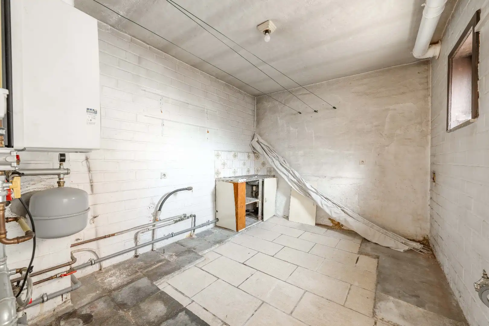 Te renoveren woning met tal van potentieel in centrum Aarsele foto 10