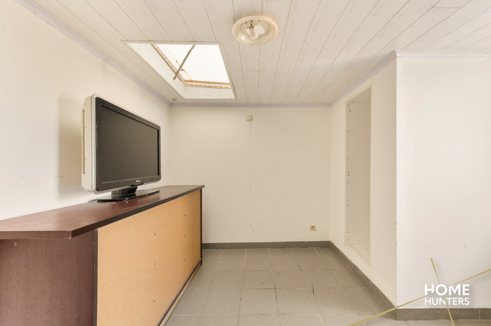 Te renoveren woning in het centrum van Ieper foto 13