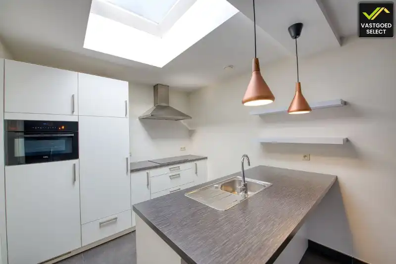 Instapklaar appartement met 2 slaapkamers, patio en parkeerplaats te huur in Assenede foto 4