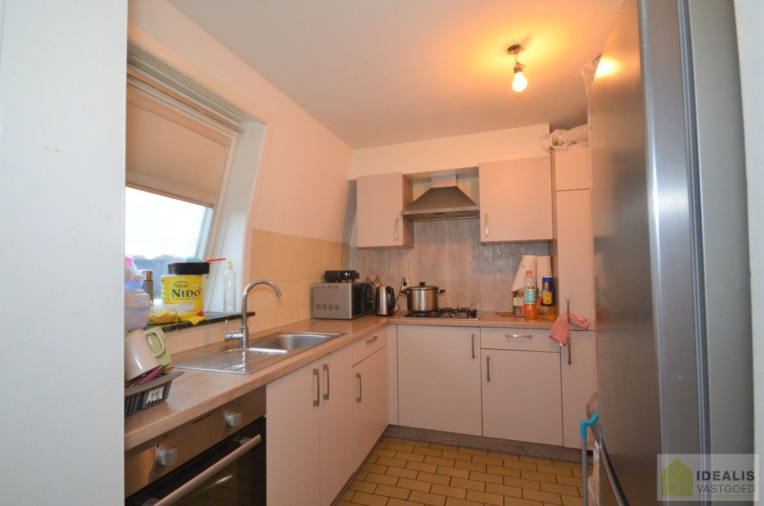 APPARTEMENT OP 2de  VERDIEP MET RUIM 80M² BEWOONBARE OPPERVLAKTE, 2 SLAAPKAMERS EN INPANDIGE GARAGE IN HET HARTJE VAN BOCHOLT foto 7
