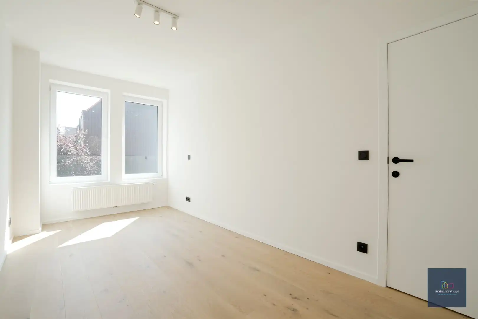 Stijlvol gerenoveerd 2 slaapkamerappartement  foto 16