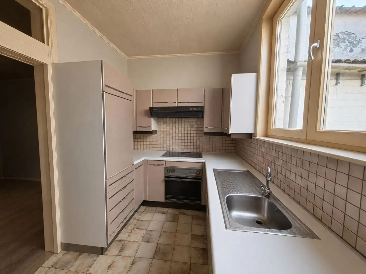 Op te frissen rijwoning foto 2